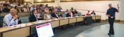Faculty attending lecture