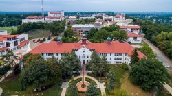 Aerial view of campus and College Hall building.