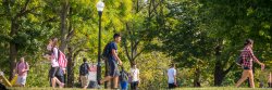 Photo of Students walking on Campus in the spring