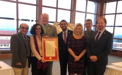Dr. Fiore with her certificate of recognition