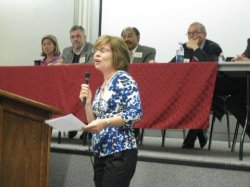 Victoria Larson, Director of the Institute, and panelists