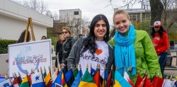 International students promoting the study abroad program at a university event