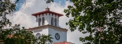 photo of University Hall through trees