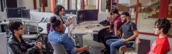 diverse group of six students in a computer lab