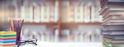 Composite photo of various school items arranged on a desk.