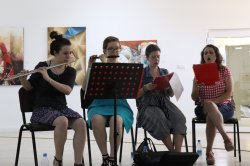 Two vocalists, flute player, piccolo player