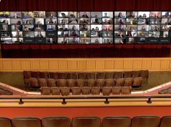 Kasser theater stage with students on Zoom