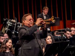 Trumpet master Arturo Sandoval plays with the University Wind Symphony at Alexander Kasser Theater as part of the Cali Immersive Residency Program.