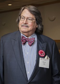 Photo of Michael Kogan at academic event