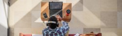 Photo of student using computer in lounge.