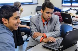 Two students sitting at computer