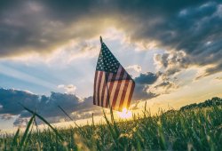 american flag on grass