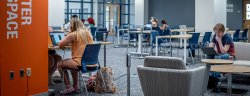 student sitting in commuter study space