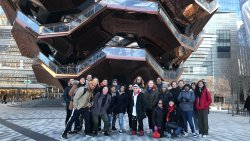 group in NYC outside architectural building