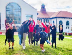 Image of students jumping for joy