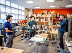 Wide view of students working while standing apart