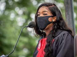 Fatimata Diabate speaking at podium