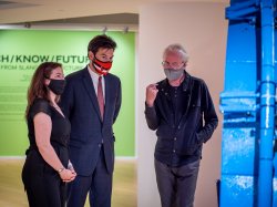 Curator Tom Leeser, with University President Jonathan Koppell and University Galleries Director Megan C. Austin