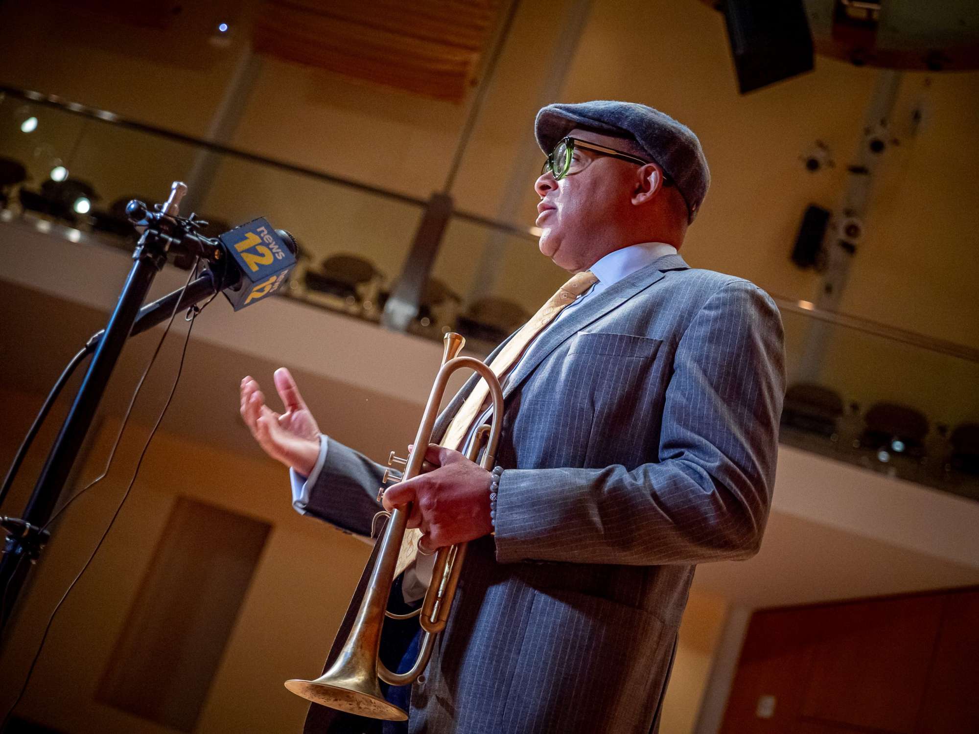 Wynton Marsalis speaking on stage