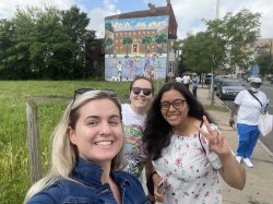 Amber Francy, Chelsea Fonseca and Rashmi Rajshekhar pose on the sidewalk