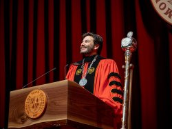 President Koppell speaking at podium