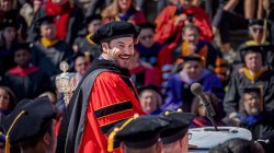 President Koppell smiles at attendees on campus