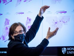 Professor Mireya Vilar-Compte presenting a map