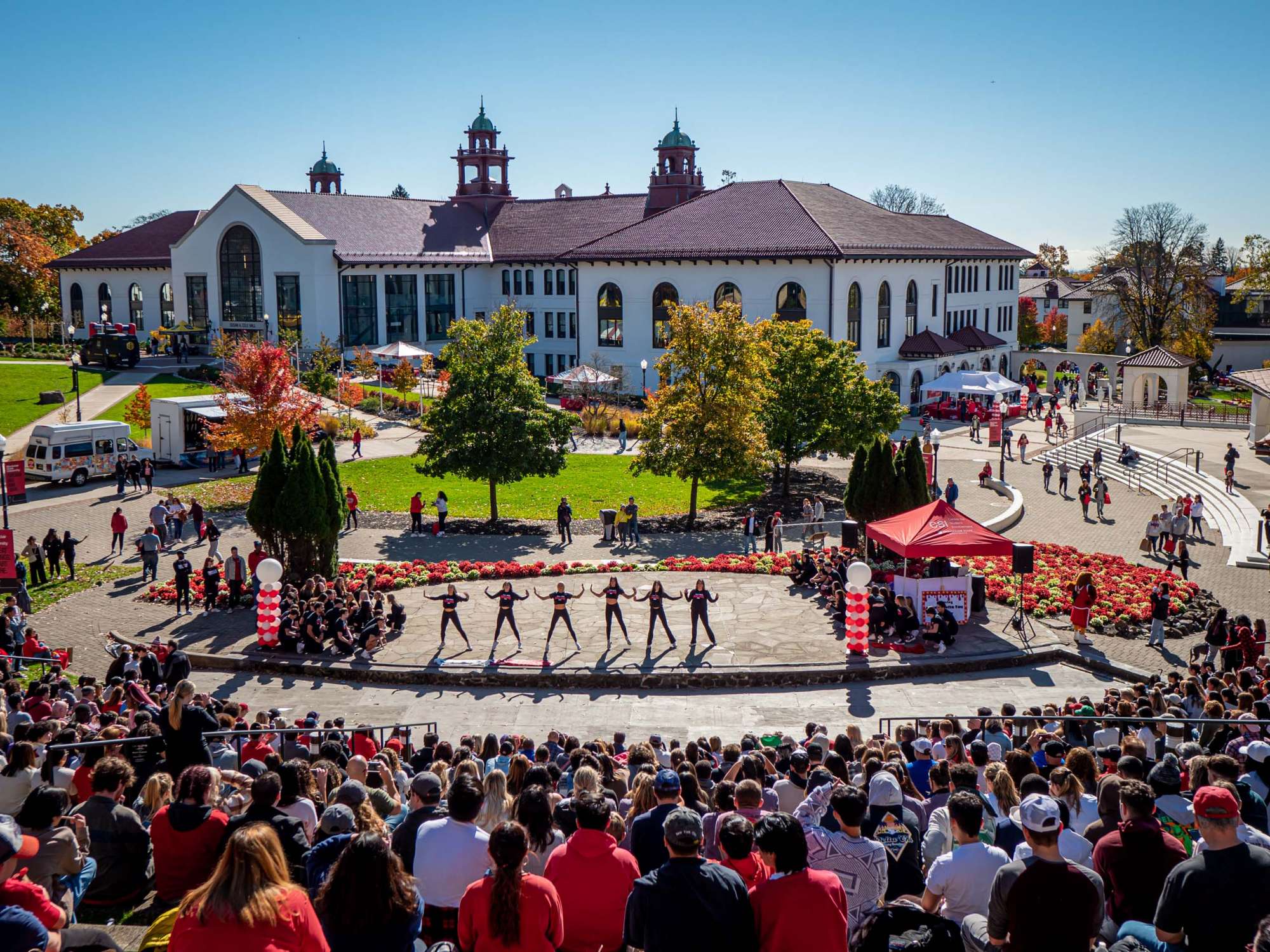 Aerial view of attendees seated in the amphitheater on campus