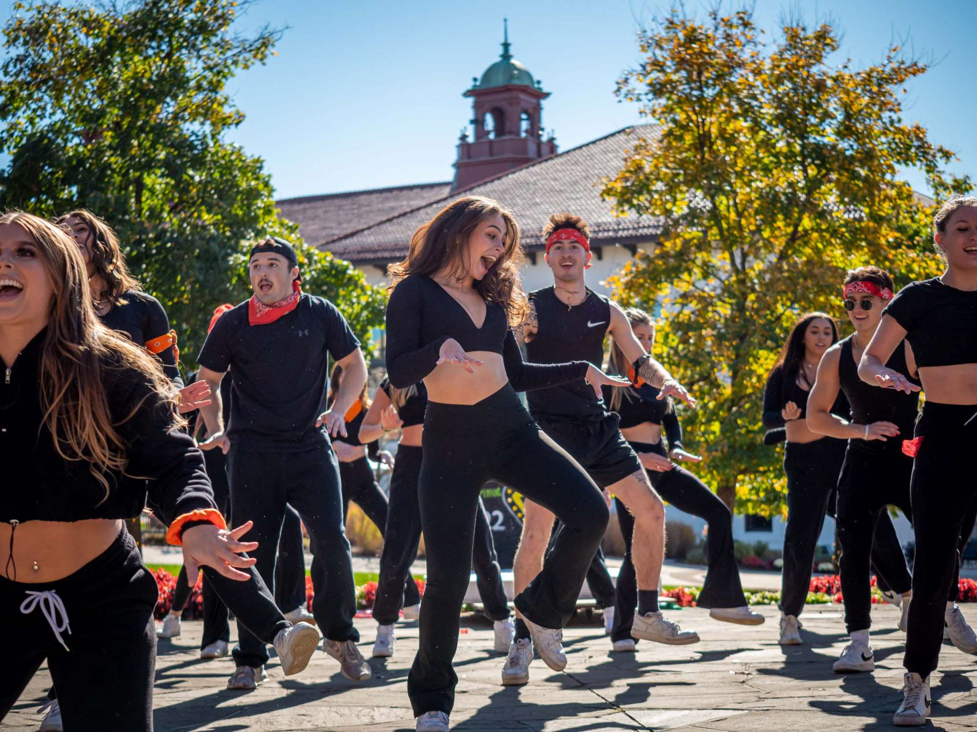Student group dancing on campus