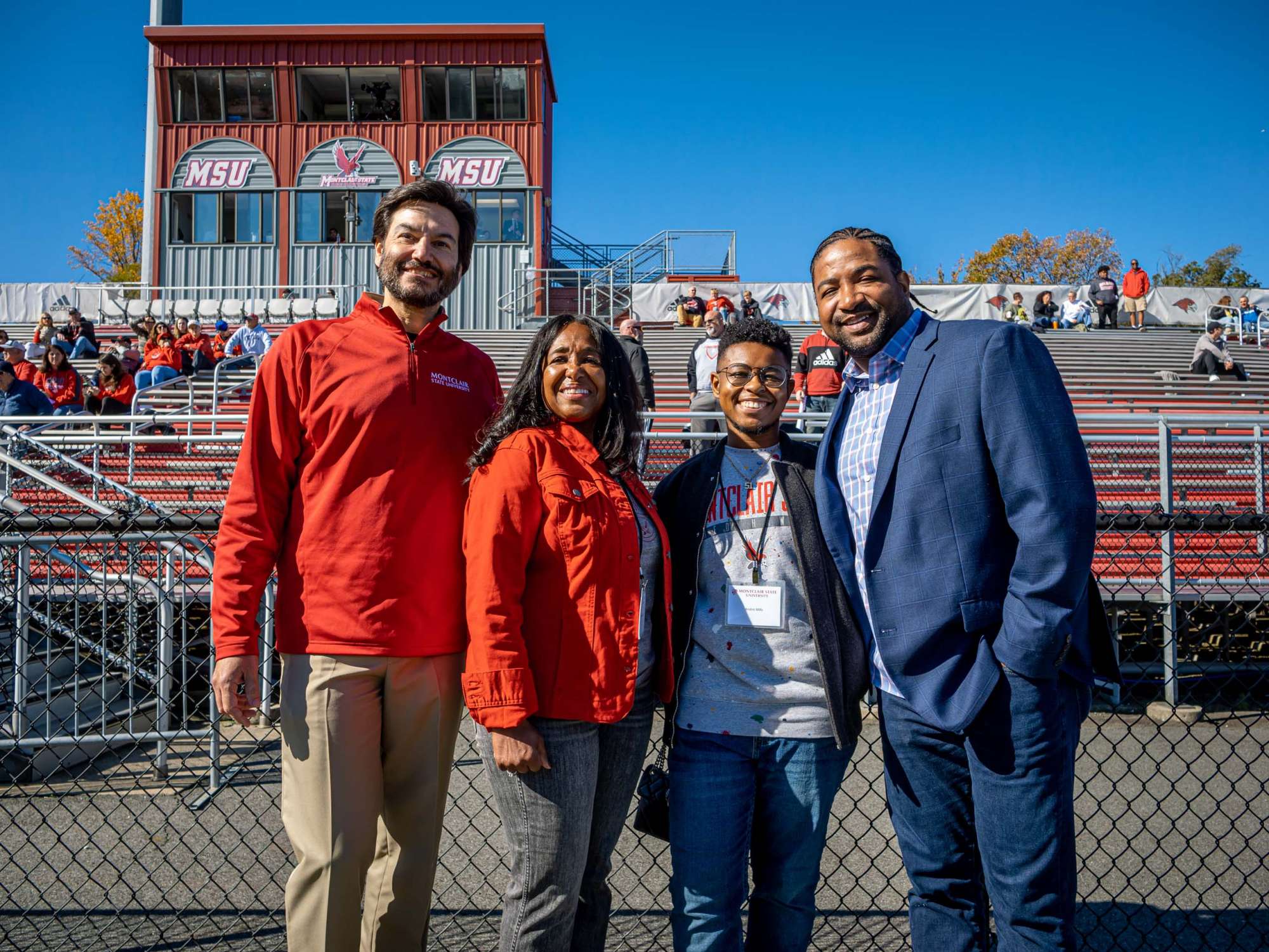 President Koppell posing with the Mills family