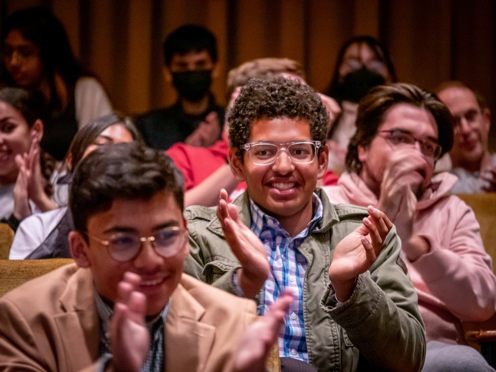 Students applaud in the audience