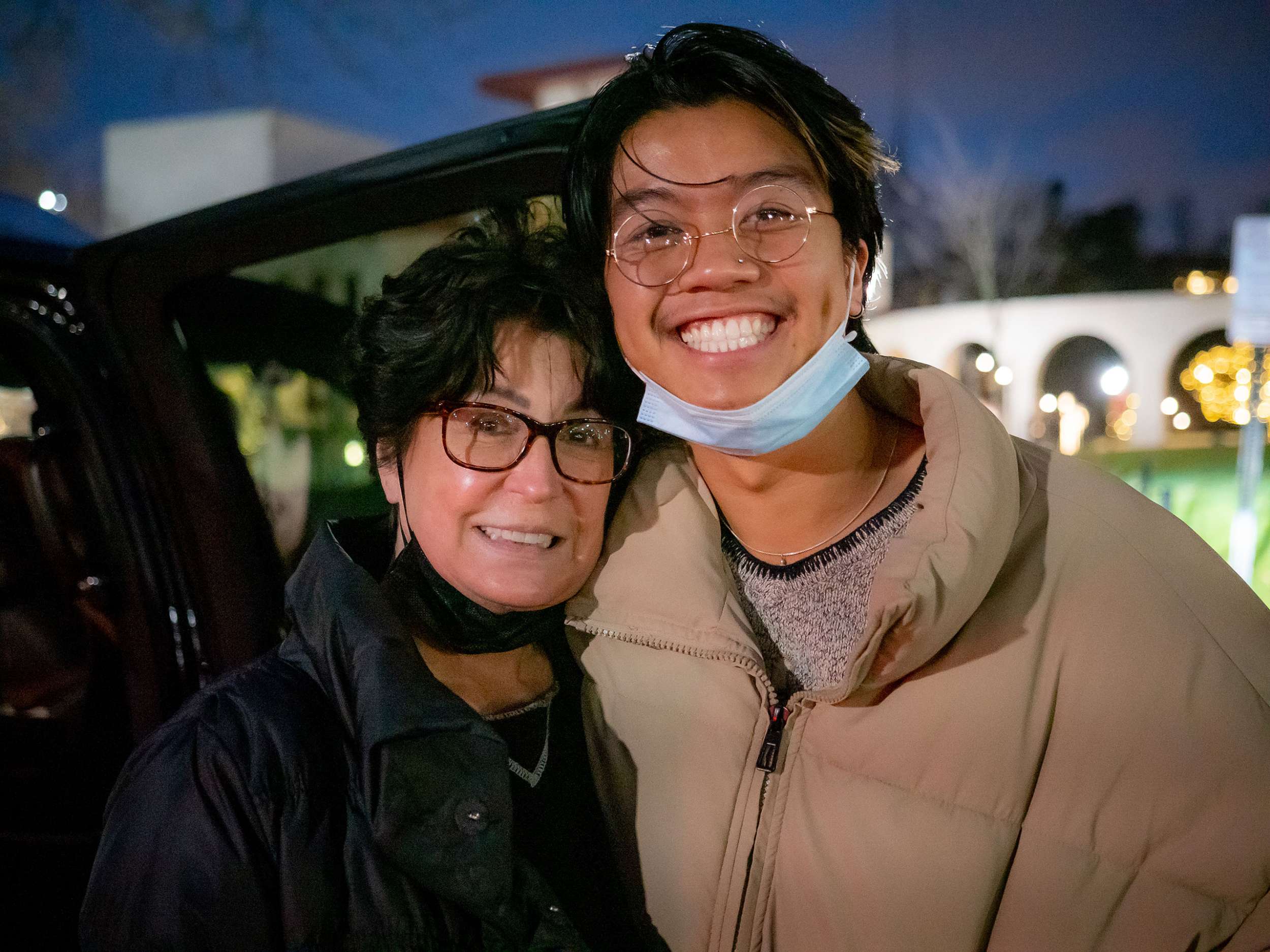 Two people smiling.