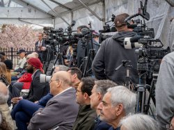 A line of camera operators.