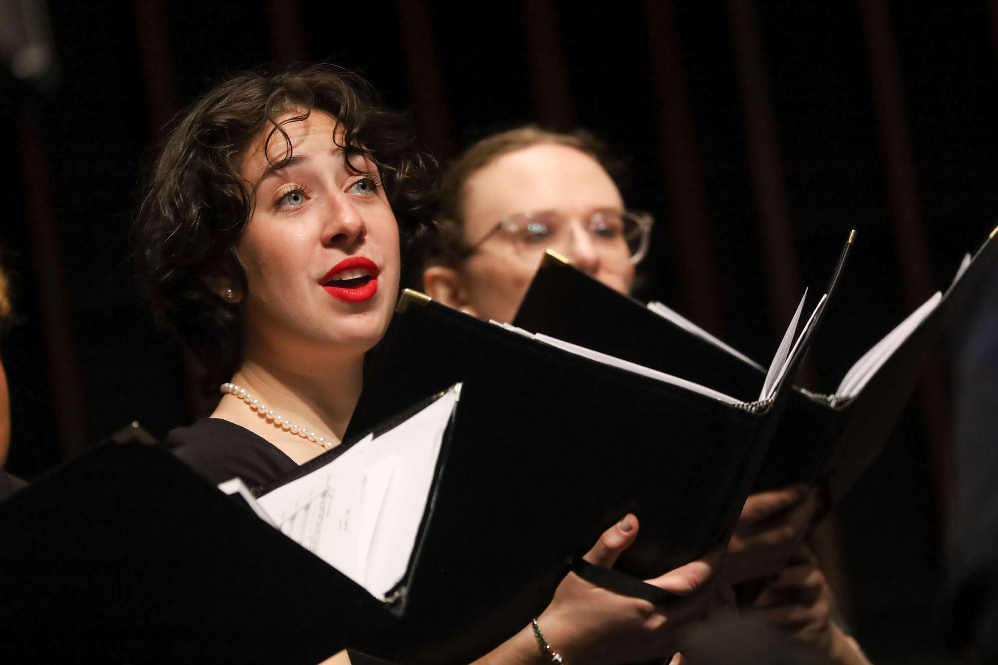 A chorus singer sings