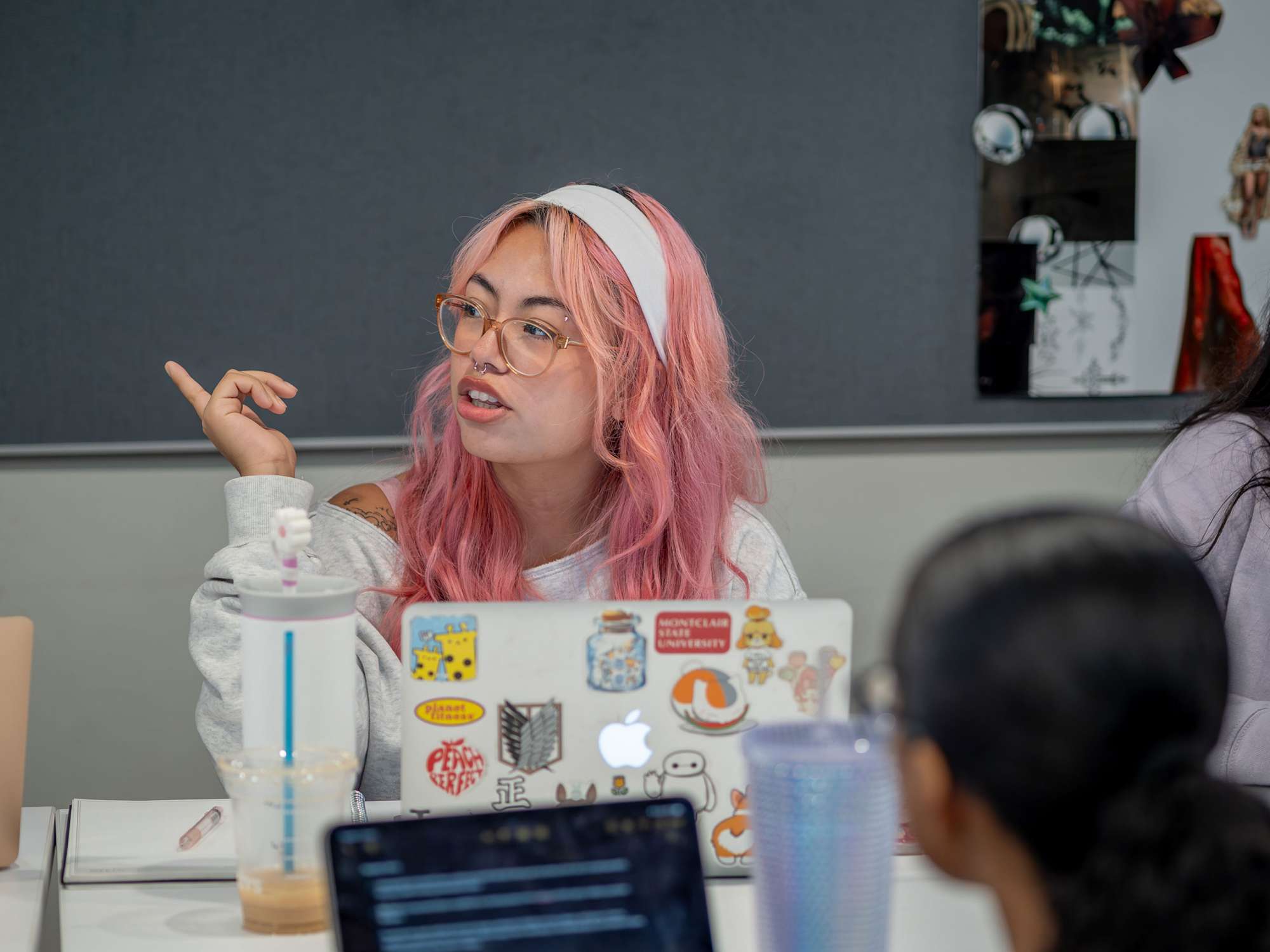 Student Bianco Pinto gestures as she makes a point.