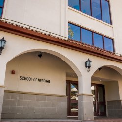 Photo of the front of Partridge Hall, home of the School of Nursing.