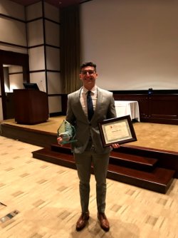 4-year BSN student Anthony Ghandour photographed receiving the Sodhani Family Scholarship.
