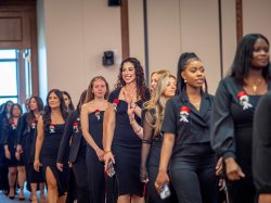 Nursing graduates processing to their seats at the Pinning Ceremony.