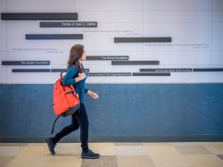 woman with backpack in CELS interior