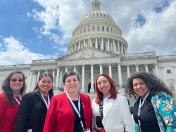 photo of students and faculty standing in front of Capitol Building in Washington DC