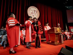 president koppell having medallion draped over his neck