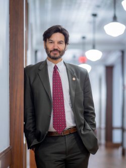 Montclair State University President Jonathan Koppell poses by inside Cole Hall on campus.