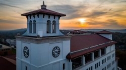 aerial view of university hall at dusk