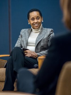 female expert participating in roundtable.
