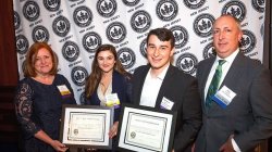 Director and students with Green Team rep receiving USGBC award