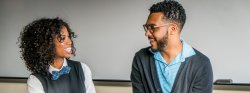 Photo of two people talking