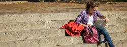 Image of Student on steps