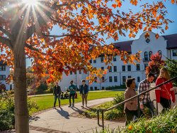 Students walking by Russ and Chapin Halls on a nice, sunny fall day.