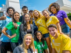 Image of a group of students standing outside the student center.