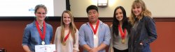 photo of Religion Honor Society recipients holding certificates